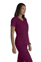 Greys Anatomy V-Neck Kim Top with Zip Front Pocket | Wine