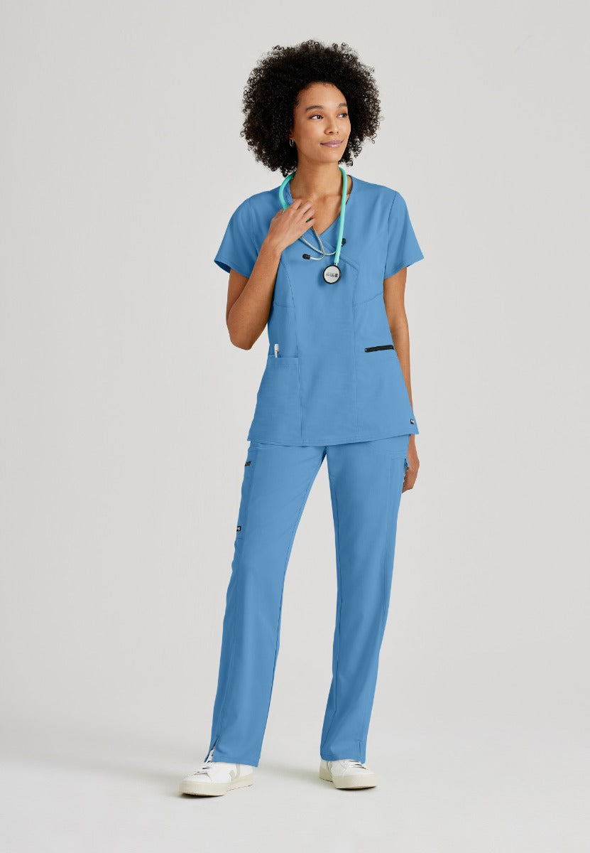 Greys Anatomy V-Neck Kim Top with Zip Front Pocket | TRUE CEIL