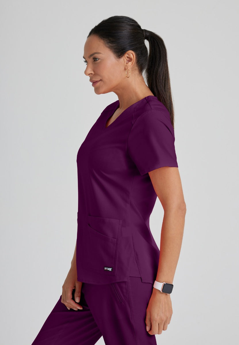 Greys Anatomy Emma 4 pocket, V-neck scrub top with angled seams | Wine