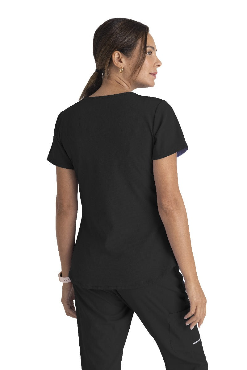 SKECHERS BREEZE 3-POCKET SHAPED HEM TOP | BLACK