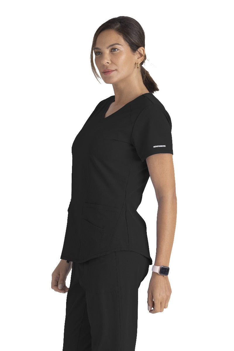 SKECHERS BREEZE 3-POCKET SHAPED HEM TOP | BLACK