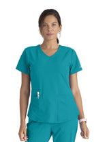 SKECHERS BREEZE 3-POCKET SHAPED HEM TOP | Teal