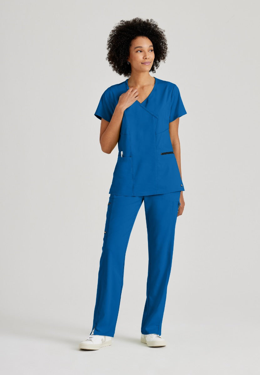 Greys Anatomy V-Neck Kim Top with Zip Front Pocket | New Royal